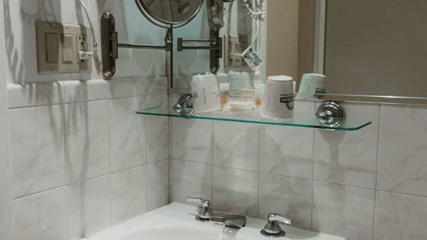 Guest Bathrooms at Premier Club feature toiletries and towels  