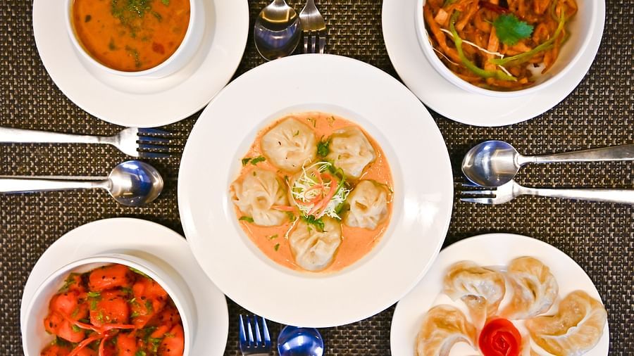 Variety of dishes set on the tables at The Soma Hotel by Avianna Group, Darjeeling