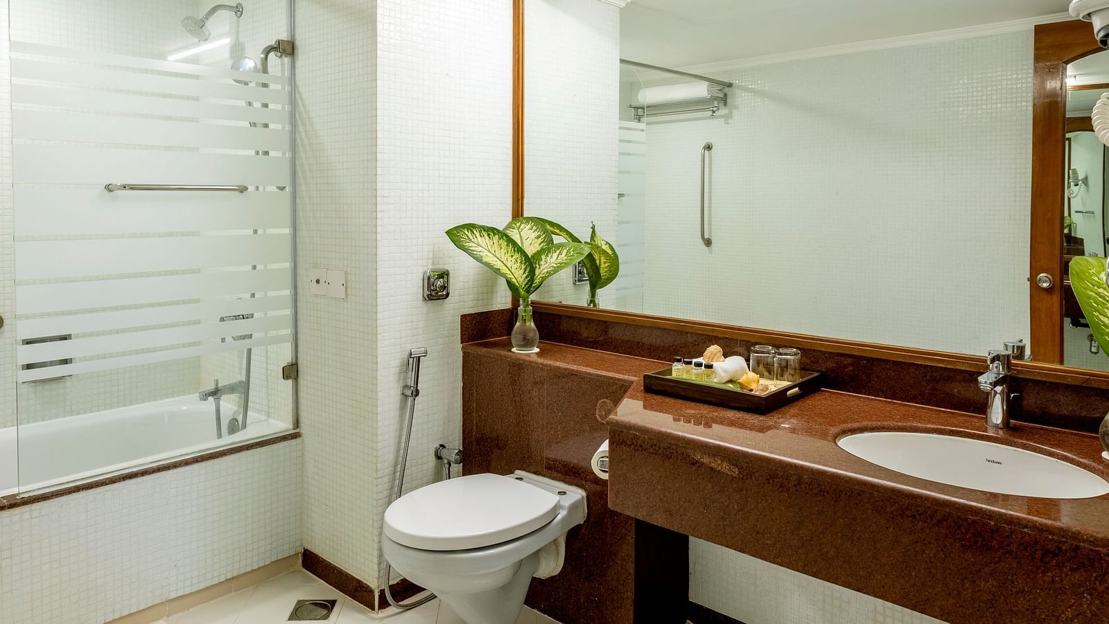 overview of the bathroom inside 2 Bedroom Garden Villa - Caravela Beach Resort Goa