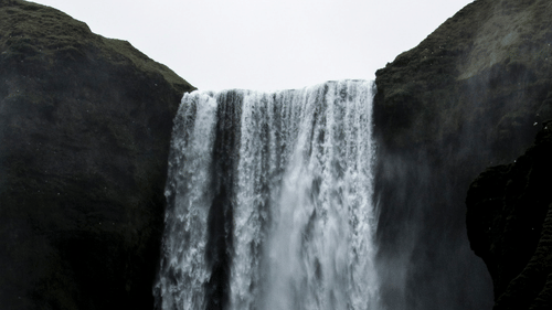 A waterfall with a strong outpour
