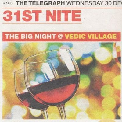 A newspaper clipping sharing an advertisement for New Year's Eve party featuring Vedic Village Spa Resort 