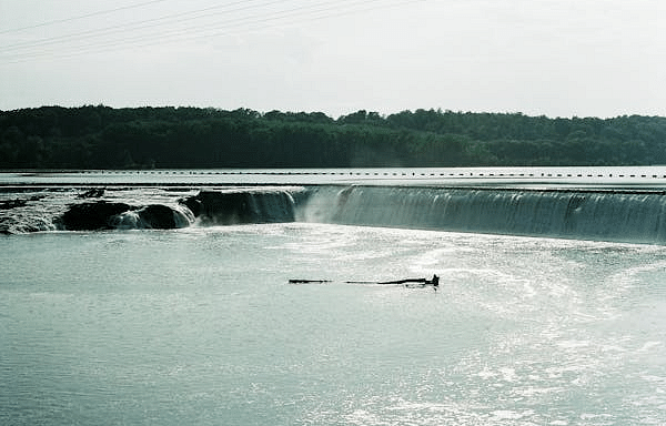An image of dam on a water reservoir