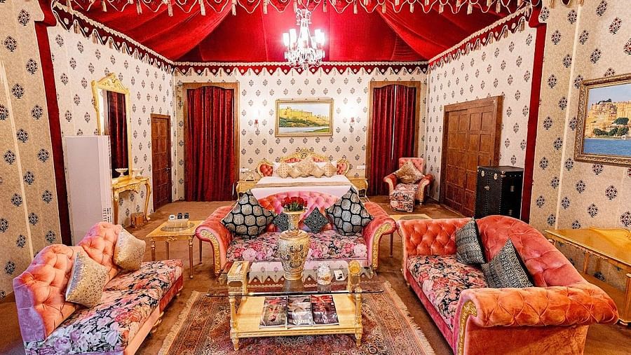 Image of Presidential Suite with sofas and a table in between at Rajasthali Resort & Spa Jaipur.