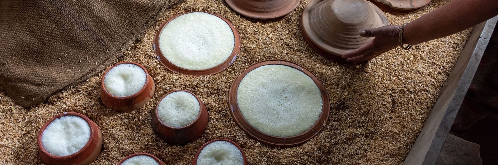 A person preparing a culinary delight
