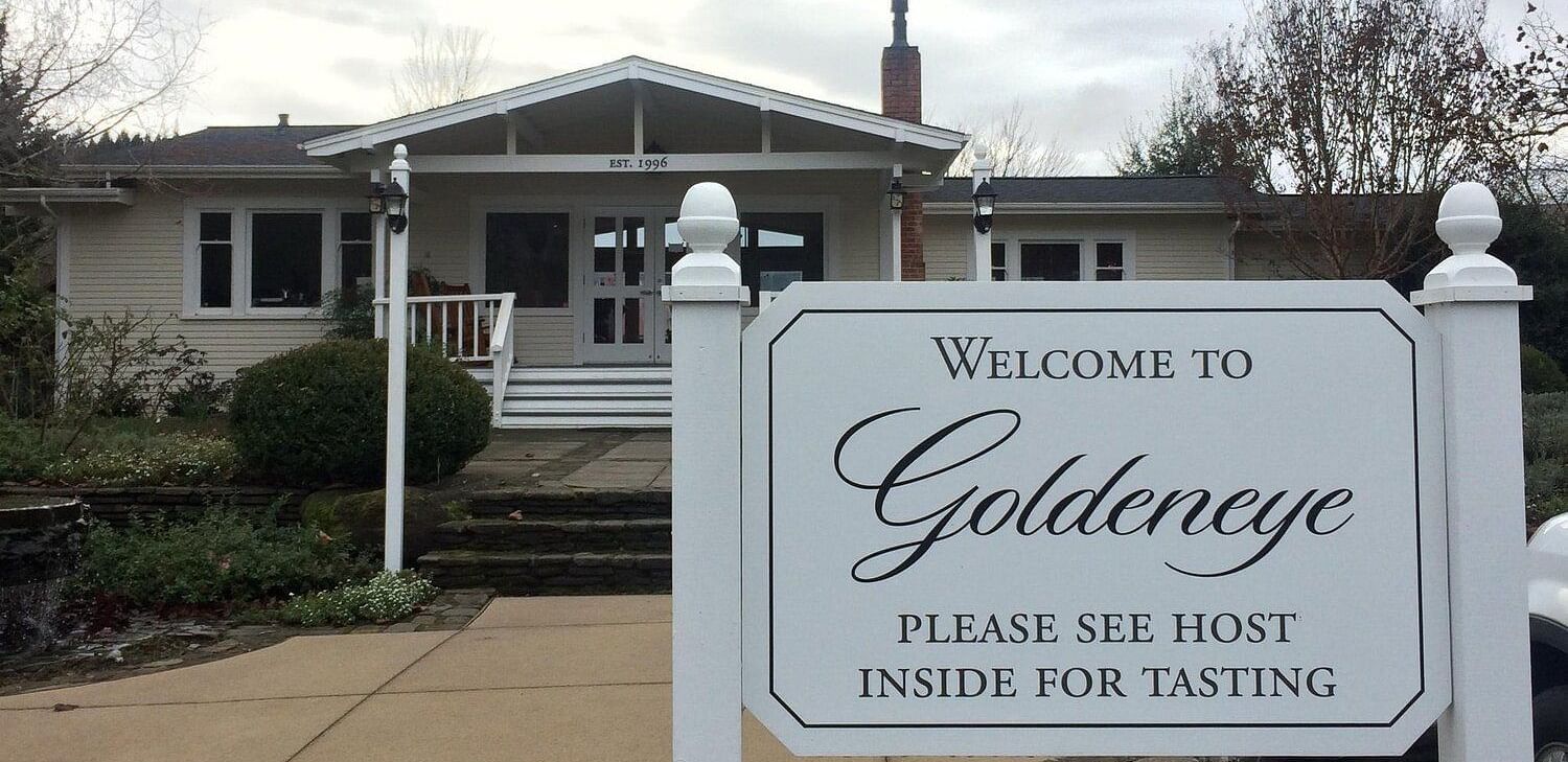 An image of a sign board on the entrance of a building which says Welcome to Goldeneye
