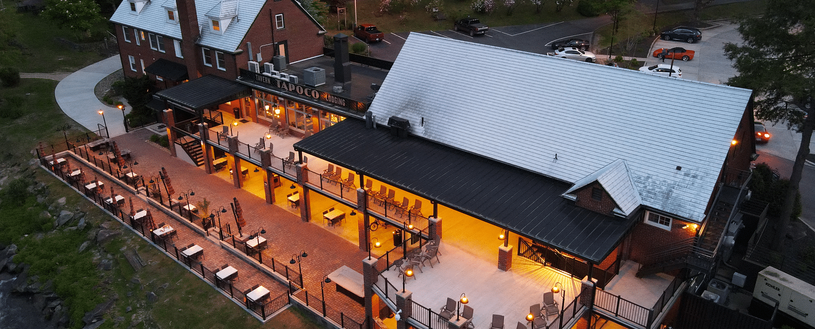 top angle of our resort featuring vast open spaces with white roof taken during the evening - Historic Tapoco Lodge