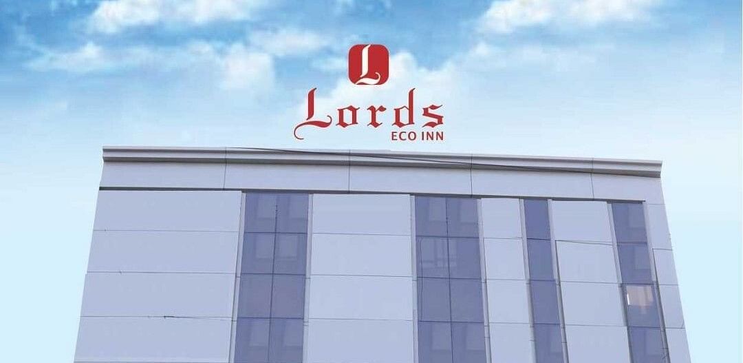 Lords Eco inn Jamnagar Maheshwari Nagar facade with blue sky in the background.