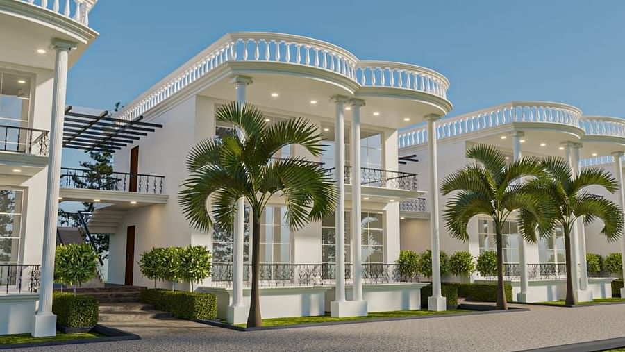 Corner view of a building with tall pillars supporting the roof from the ceiling.