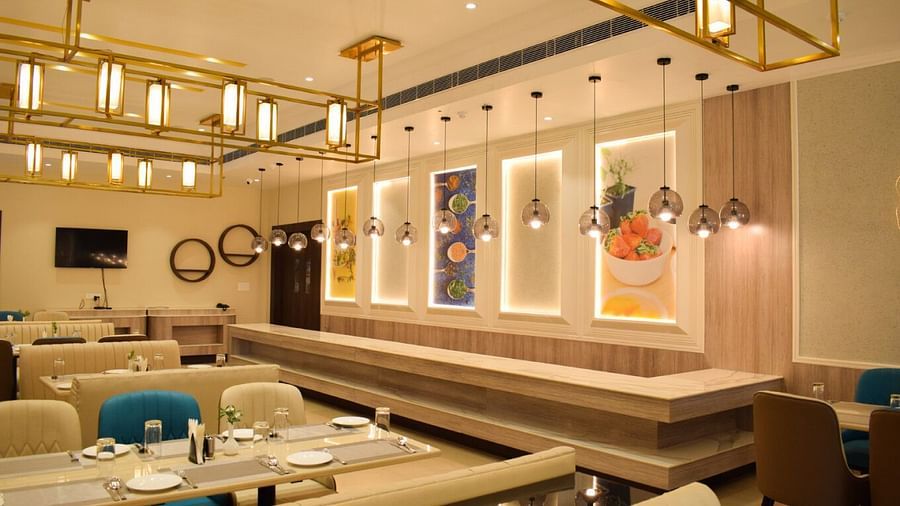 Close up shot of the decor and seating arrangements inside tulipe restuarant at Tulip Inn, Shravasti