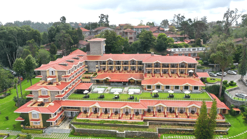 Aerial exterior view of the multi-storey 5-star hotel in Kodaikanal, The Carlton.