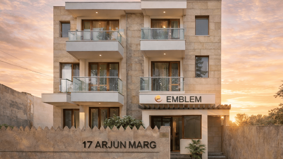 An exterior view of the building entrance and facade of EMBLEM - Arjun Marg, Golf Course Road, Gurgaon.