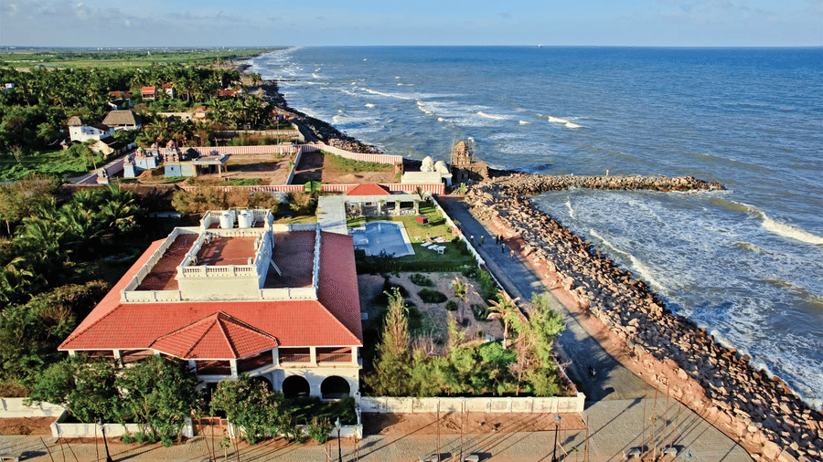 aerial view of the Facade with the swimming pool and the sea in full view - Neemrana's The Bungalow on the Beach Tranquebar