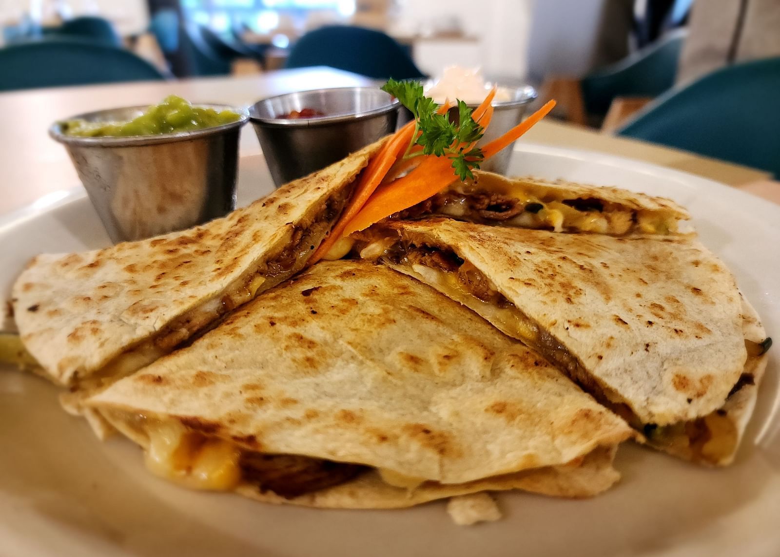 Cheesy quesadilla paired with salsa and guacamole - Hotel 39, Jamaica