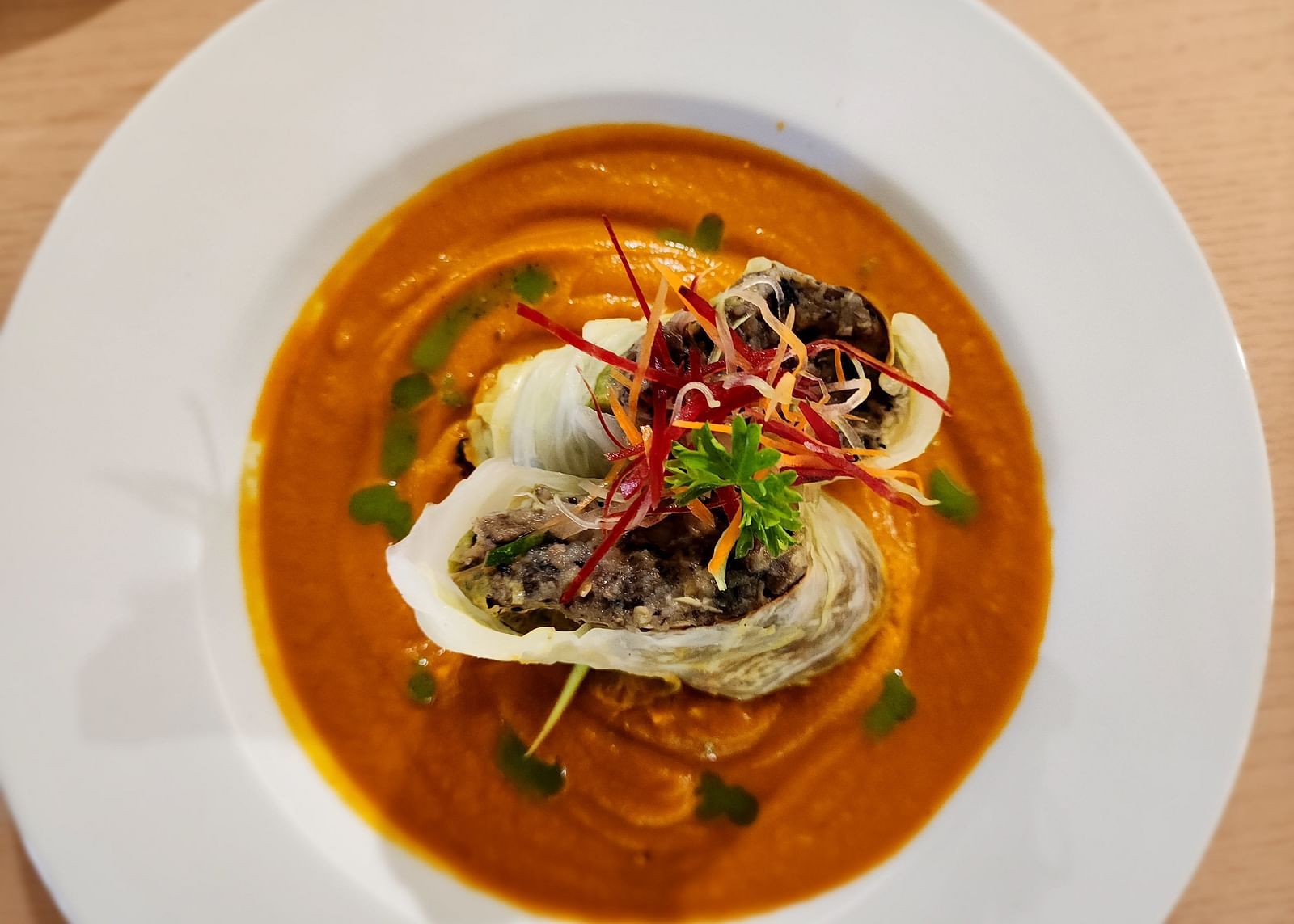 An elegant seafood dish swimming in a creamy sauce - Hotel 39, Jamaica