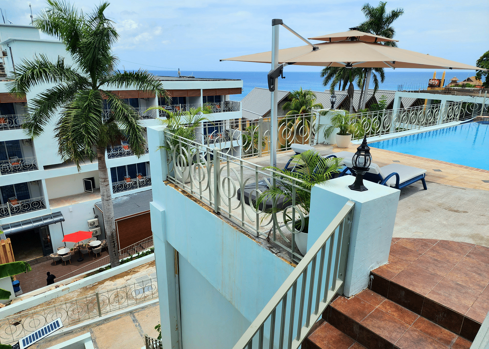 A staircase leading to the rooftop swimming pool at our hotel in Montego Bay - Hotel 39, Jamaica