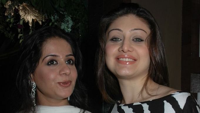 two women posing for a picture at IOSIS Spa & Wellness