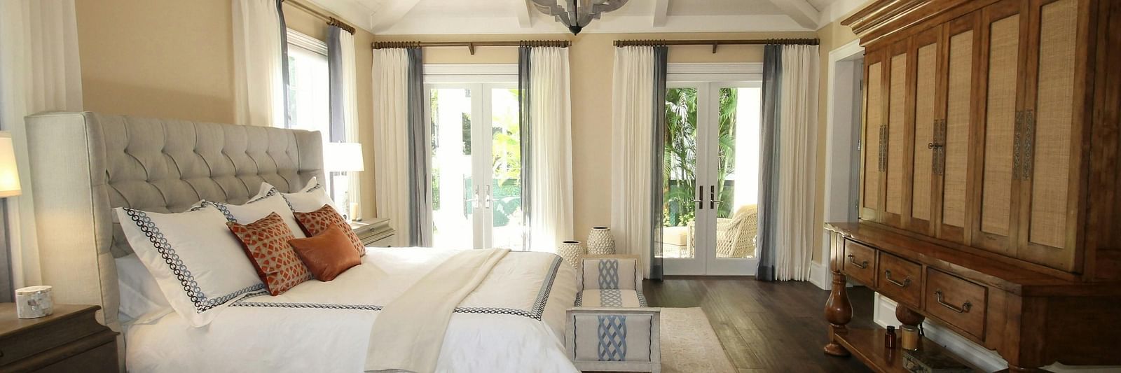 Hotel room with spacious bed and beautiful  chandelier