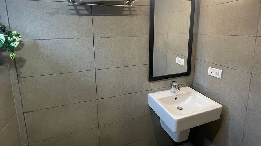 Image of a washbasin in the washroom at Sanctum Suites Richmond Road Bangalore