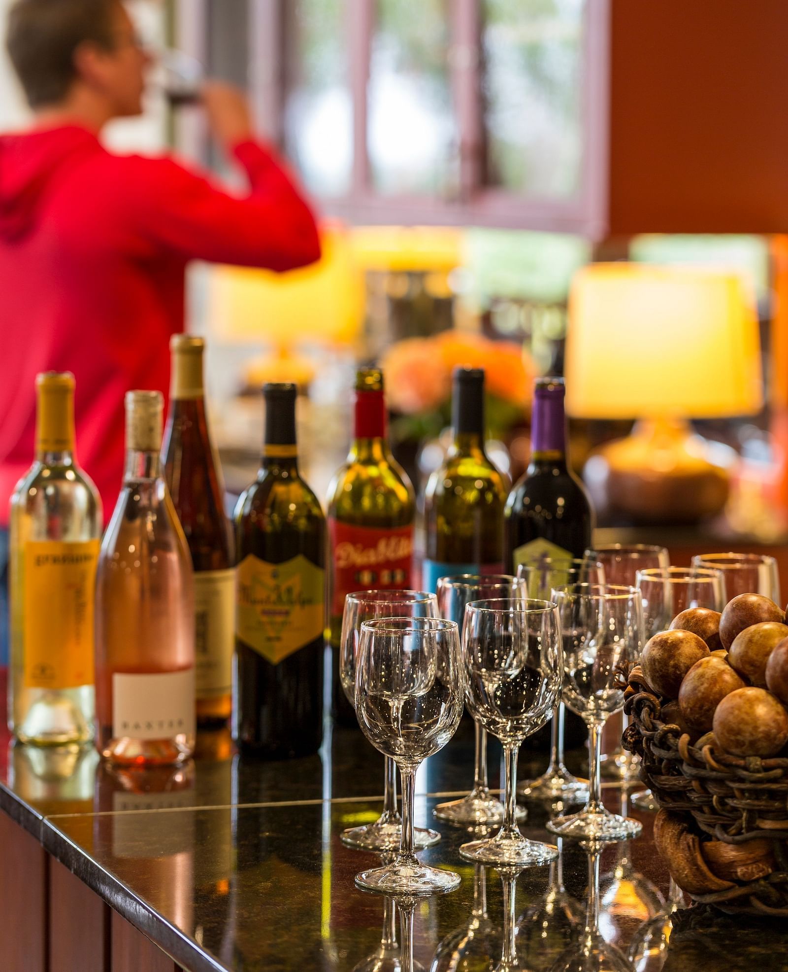 A lively bar with fine wines and spirits on display - Brewery Gulch Inn & Spa
