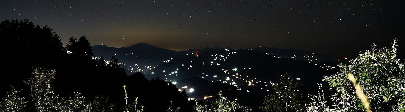 The city of Mukteshwar in the night as seen from a far place.