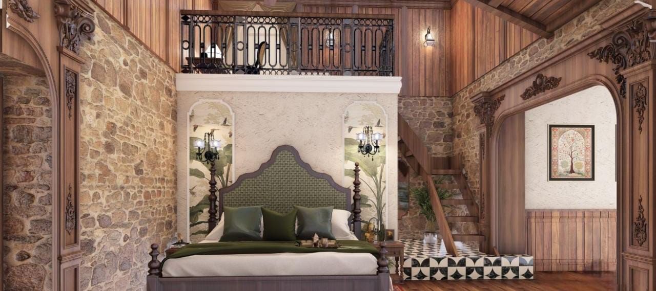 Cosy bedroom with a mezzanine level, exposed timber beams, and a stone accent wall, giving a cabin aesthetic at BluSalzz Terrah Hills Resort, Dalhousie.