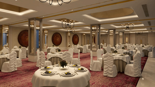 tables set up inside Aura banquet hall at Sarovar Portico Birgunj