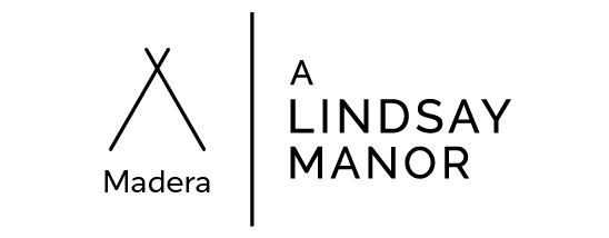 Logo for Madera - A Lindsay Manor, featuring an abstract crossed-line symbol and the name of the villa.