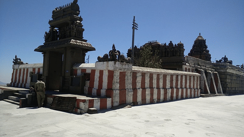 An overview of Himavad Gopalaswamy betta Temple with trees in the background.