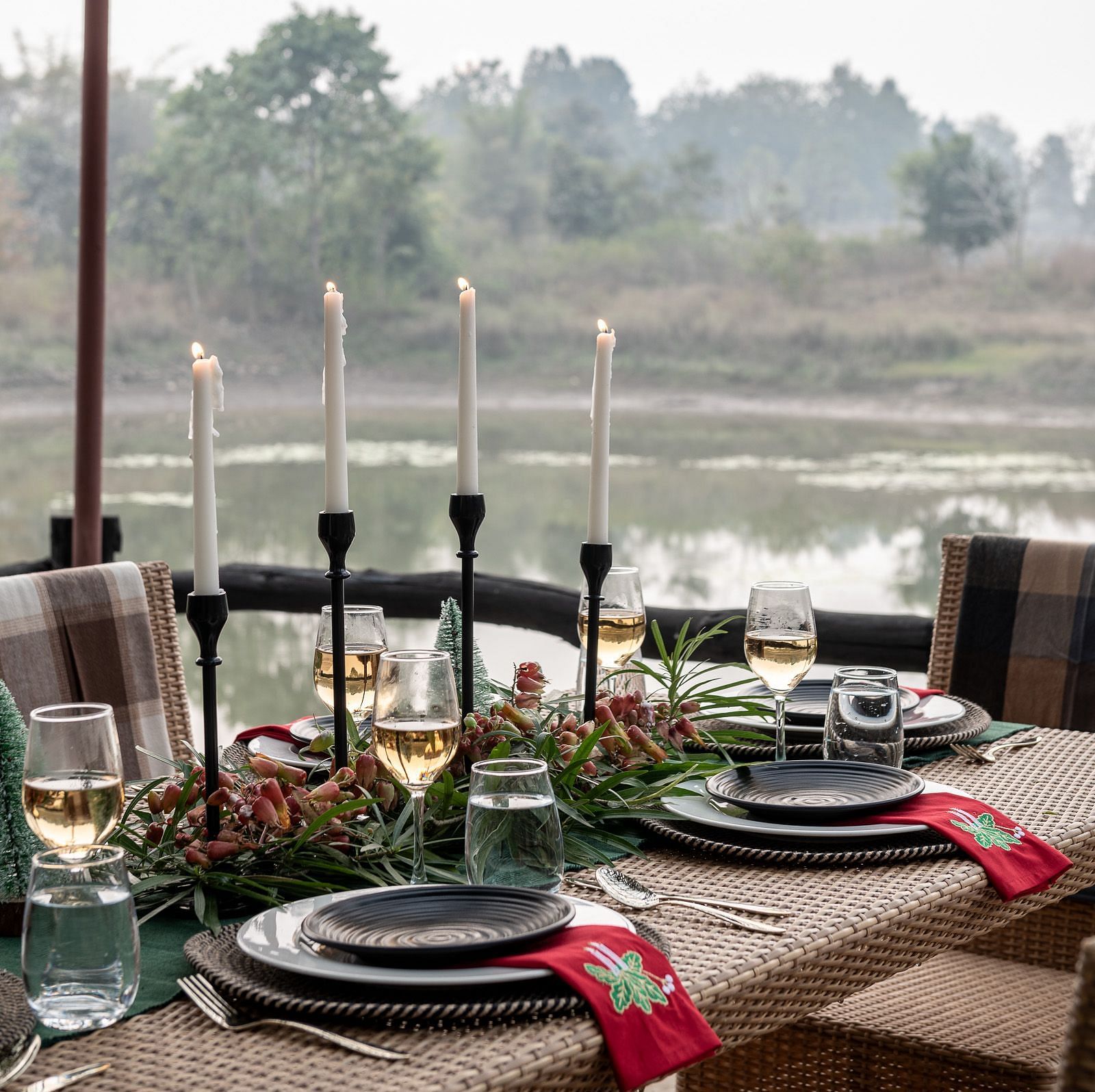 Closeup of the dining setup at Swimming Pool at Saccharum Safari Lodge, Balaghat