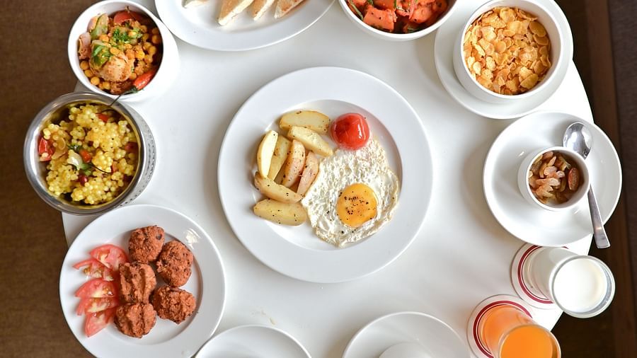 Top  view of a platter with a vareity of food at The Soma Hotel by Avianna Group, Darjeeling