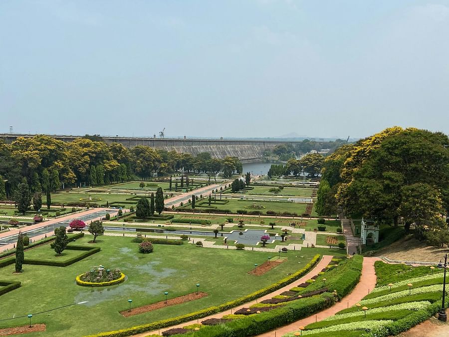 A beautifully landscaped garden with lush greenery and fountains