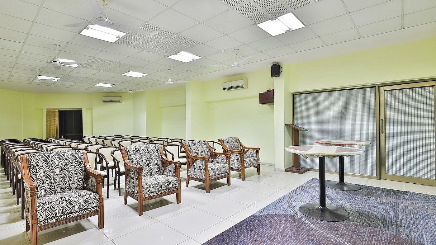 A conference hall with chairs facing the stage at VITS Select, Bharuch.