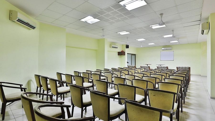 A conference hall with chairs facing the stage at VITS Select, Bharuch.