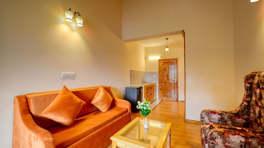 Well lit seating area with sofa - Clarks Inn Suites, Manali