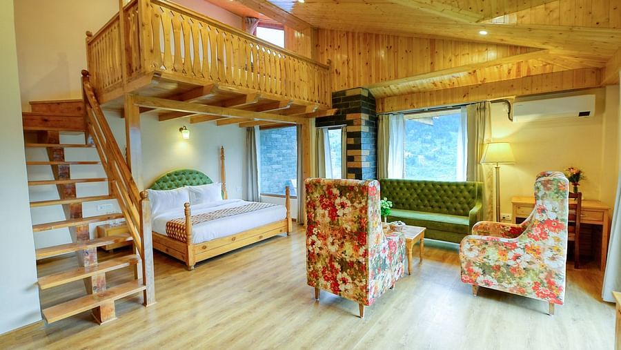Room with a double bed, attic area and seating arrangement - Clarks Inn Suites, Manali