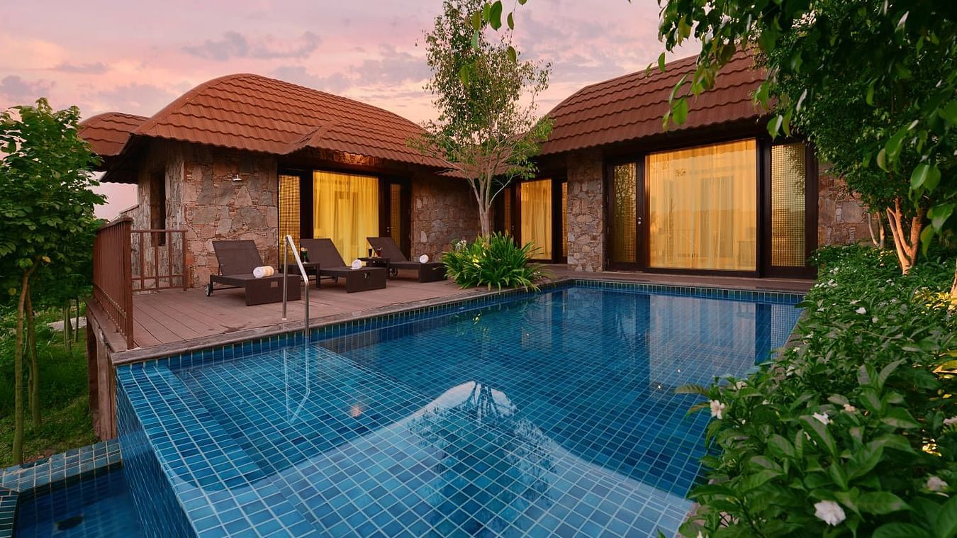 A swimming pool in front of the Presidential suites - The Ananta Udaipur