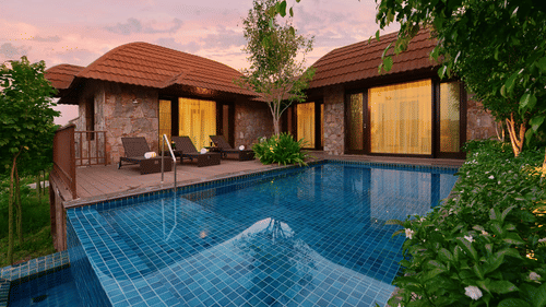 A swimming pool in front of the Presidential suites - The Ananta Udaipur