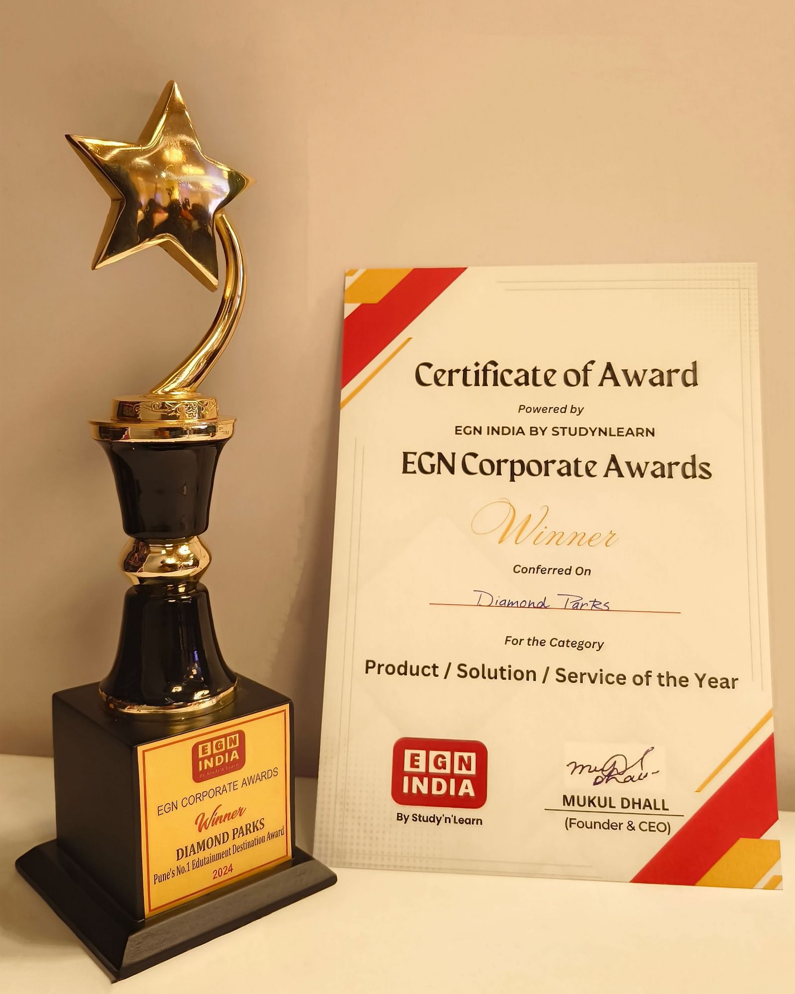 EGN Awards picture with a certificate - Diamond Parks, Pune 
