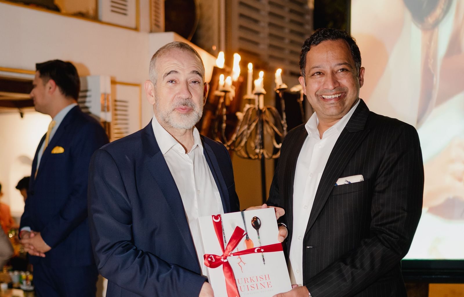 Image of two man holding a reward at the Selliva week at The Claridges New Delhi - Claridges Collection