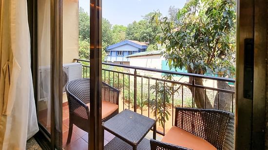 Picture showing the Balcony in the Super Deluxe Triple Suite, at ZARA’s Resort, Khandala