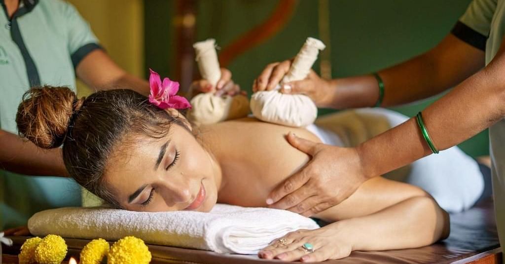 Two Spa Therapists massaging a model at Ocean Spray Puducherry 