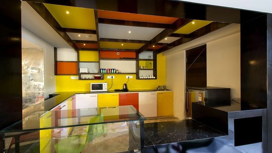 Pantry area with colourful ceiling at Art Boutique Hotel, Hyderabad 