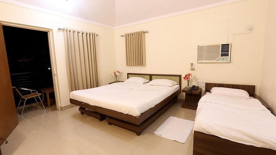 Classic Room Interior - Sajan - Classic AC Rooms at Nature Trails Sajan offering cosy interiors and scenic forest surroundings.