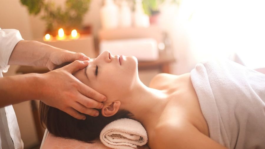 A woman getting a head massage