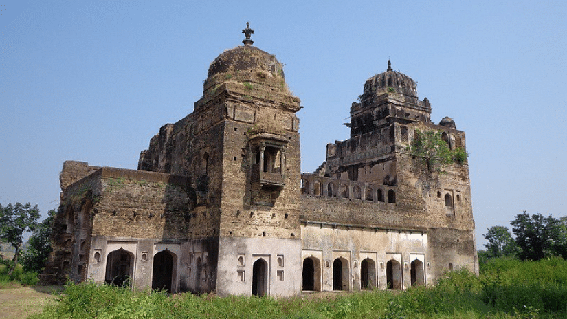 An exterior view of Moti Mahal, showcasing its majestic architecture and vibrant surroundings, reflecting the rich heritage of the region.