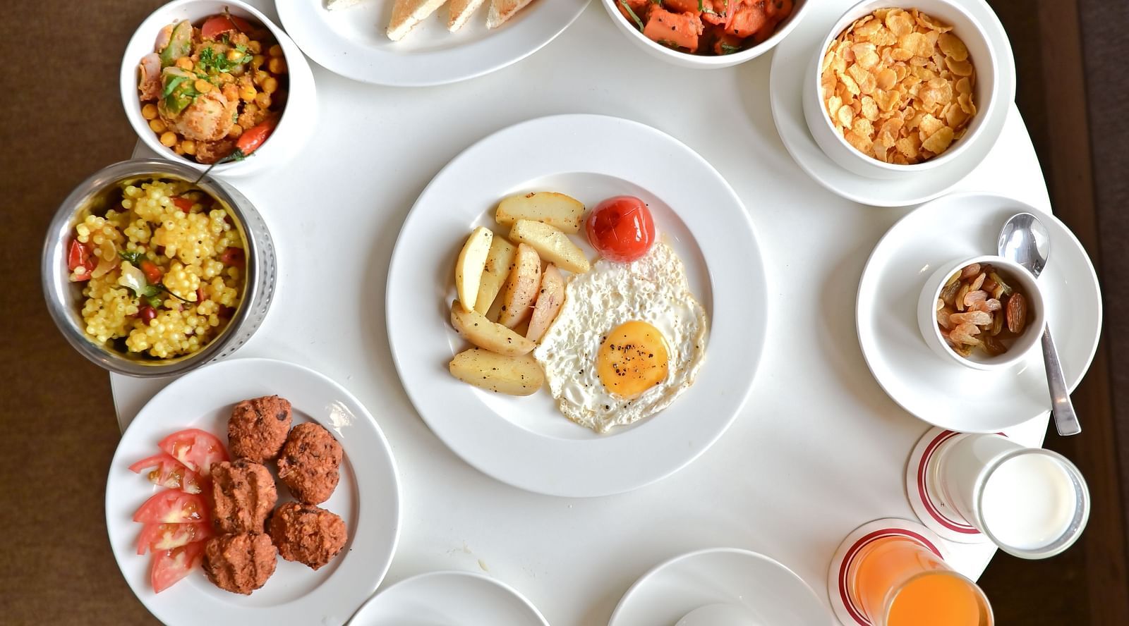 Top  view of a platter with a vareity of food at The Soma Hotel by Avianna Group, Darjeeling