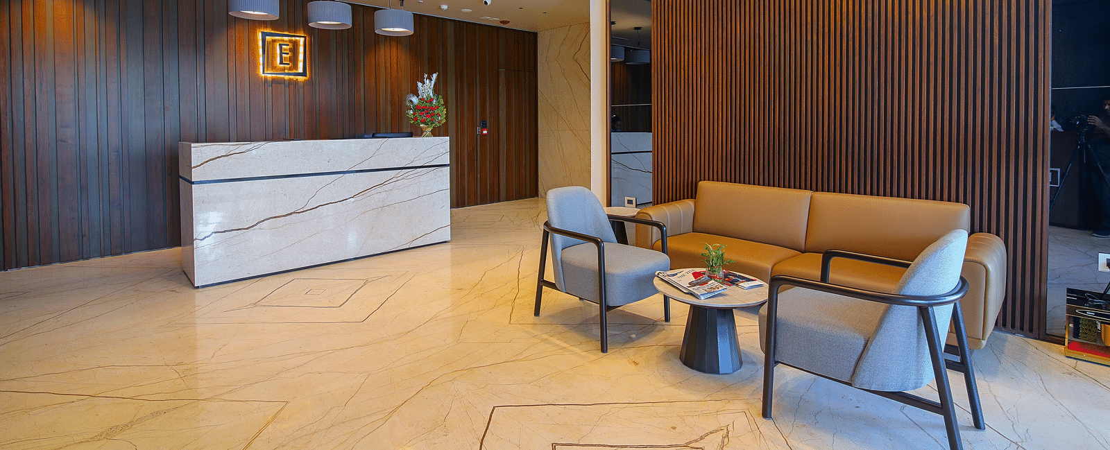 Overview of the Reception desk at the lobby at Essentia Premiere, Pune.