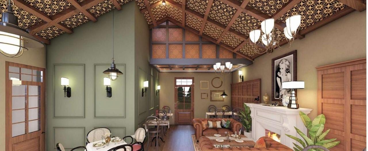 An open-plan living area showcases a high, decorative ceiling, with a dining table and kitchen visible beyond - BluSalzz Escapade Resort, Dalhousie 