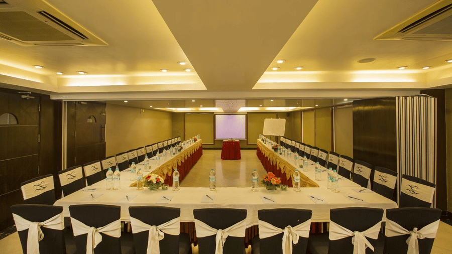 A large conference room set up in a U-shape for a formal meeting or presentation - The Citrine, Bangalore
