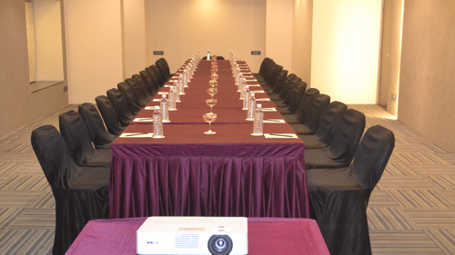 Rectangle table seating arrangements inside a banquet hall - VITS Sharanam, Thane